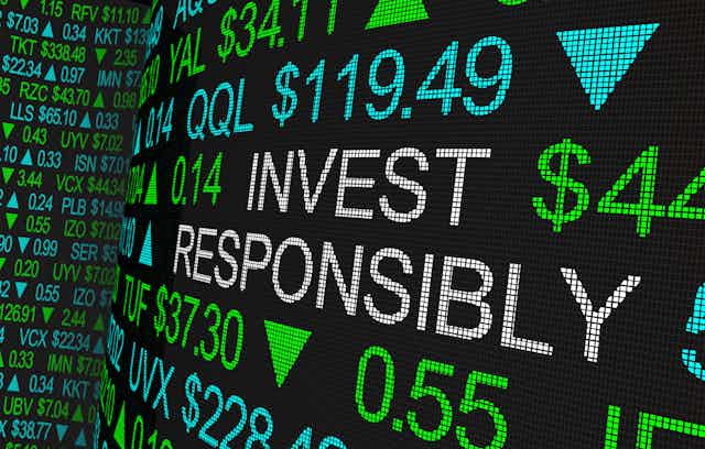 A stock market board displaying the phrase 'INVEST RESPONSIBLY' in between numbers