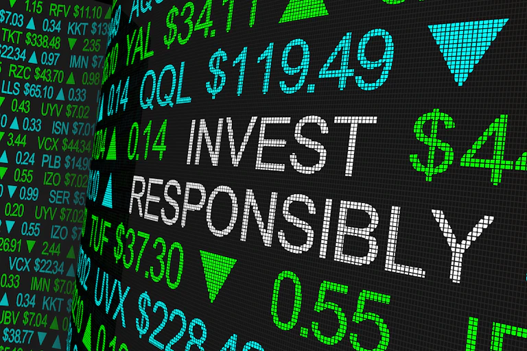 A stock market board displaying the phrase 'INVEST RESPONSIBLY' in between numbers