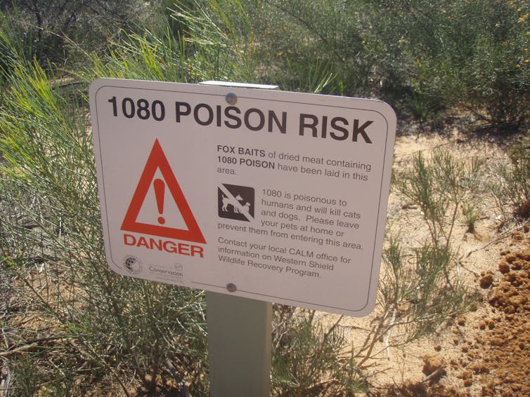 Sign in the bush indicating 1080 poison bait is in use in the area.