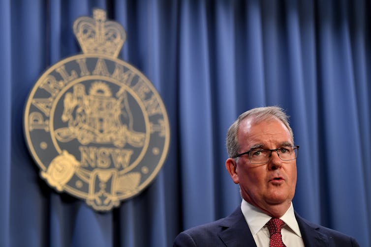 NSW Attorney General Michael Daley addresses the media