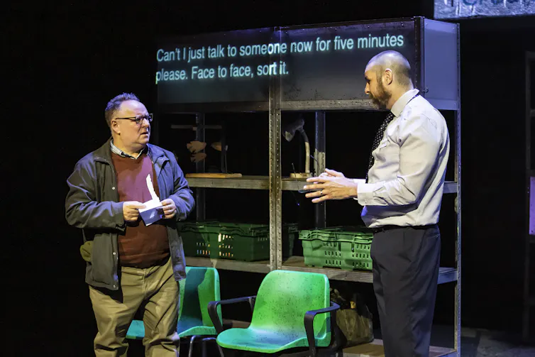 Two men on stage.
