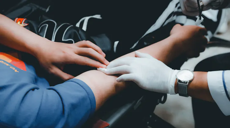 Person gets a blood test
