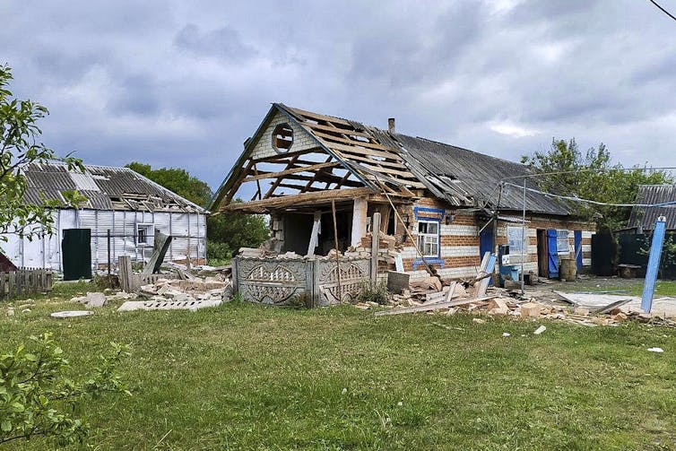 A badly damaged house.