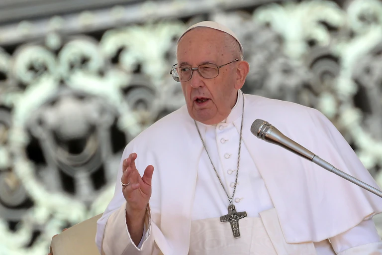 Pope Francis at microphone