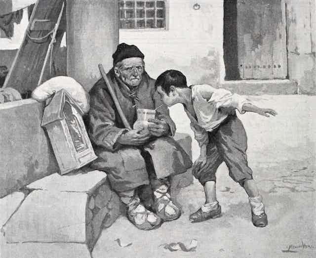 Un niño bebe de la jarra de un hombre mayor por una pajita.
