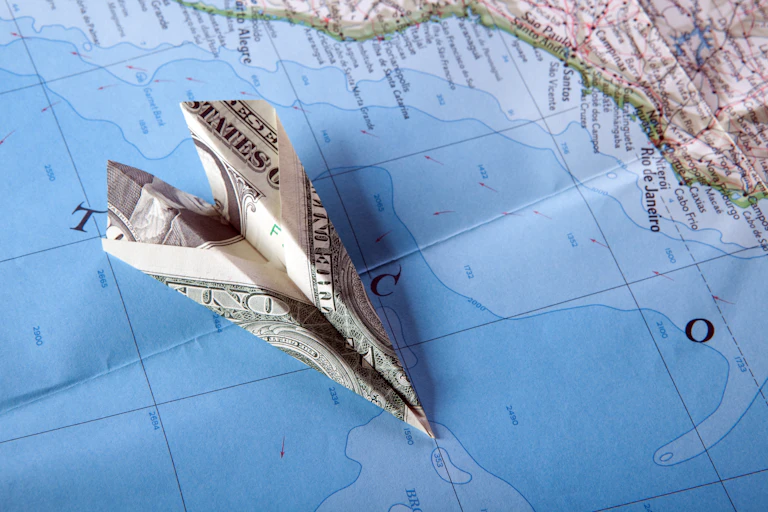 US dollar bill on a map.