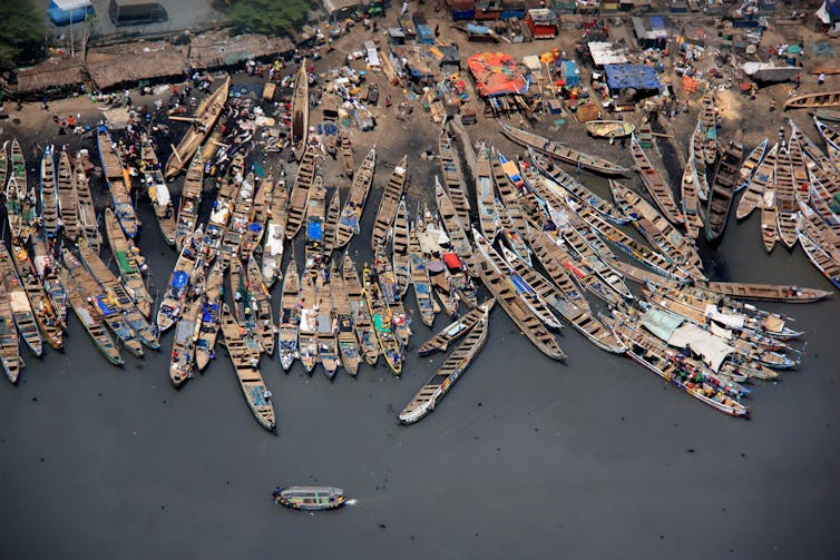 Fishing boats tied together in Ghana.