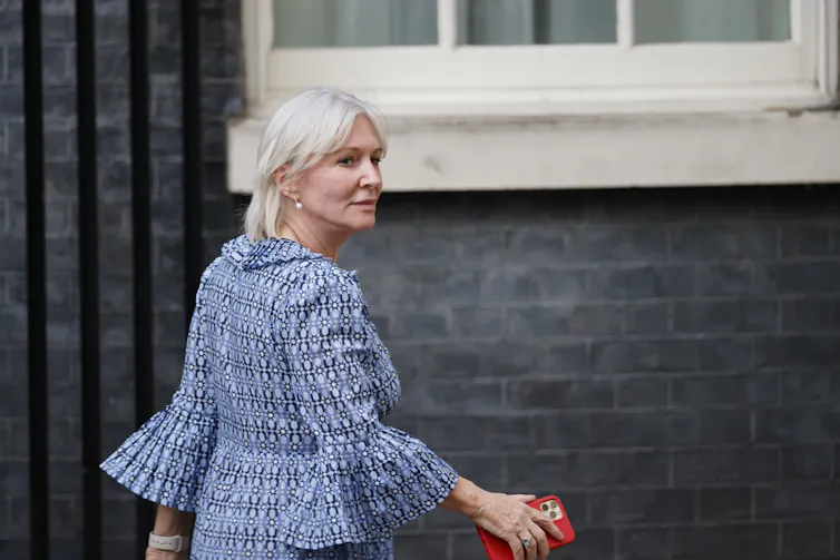 Nadine Dorries walking down Downing Street.
