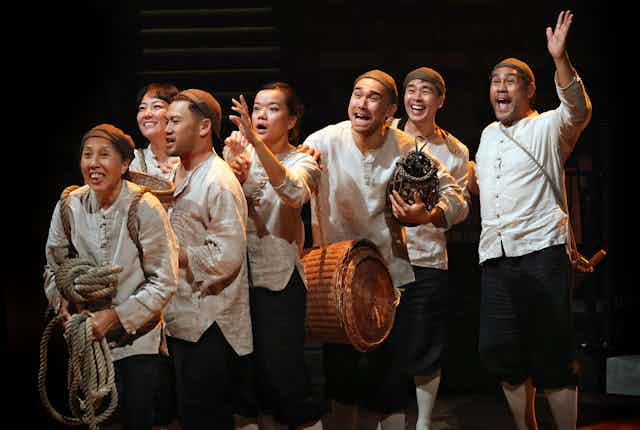 Seven actors playing Chinese migrants