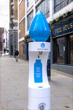 A photo of a bottle filling station on a London street.