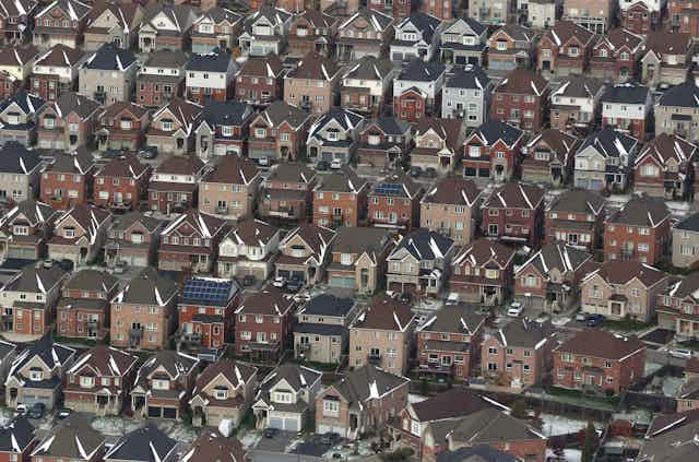 A aerial photo of rows of houses.