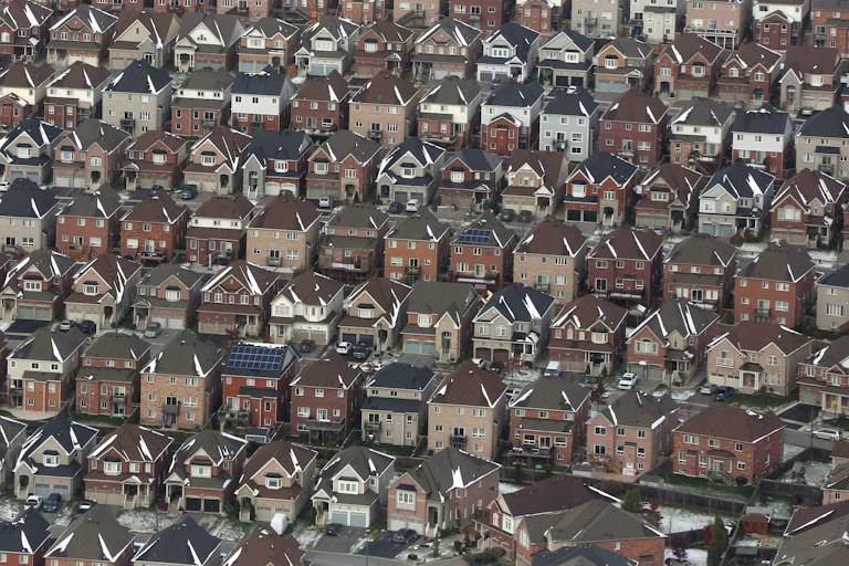 A aerial photo of rows of houses.