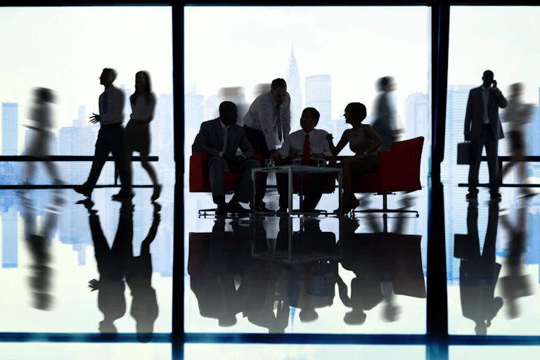 People sitting at a boardroom table