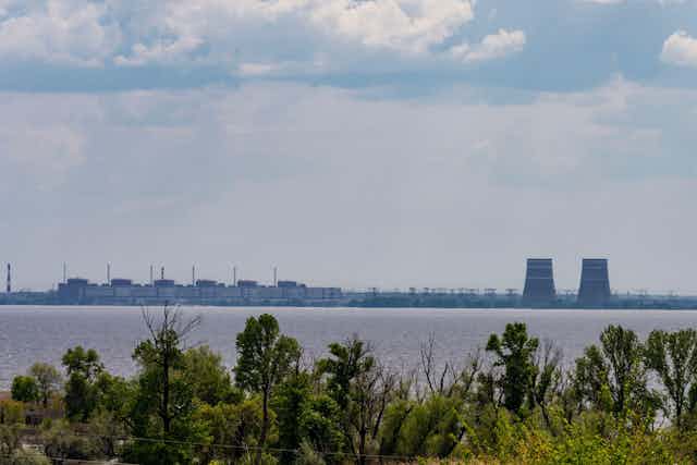 A view across a river of the Zaporizhzhya nuclear power plant.