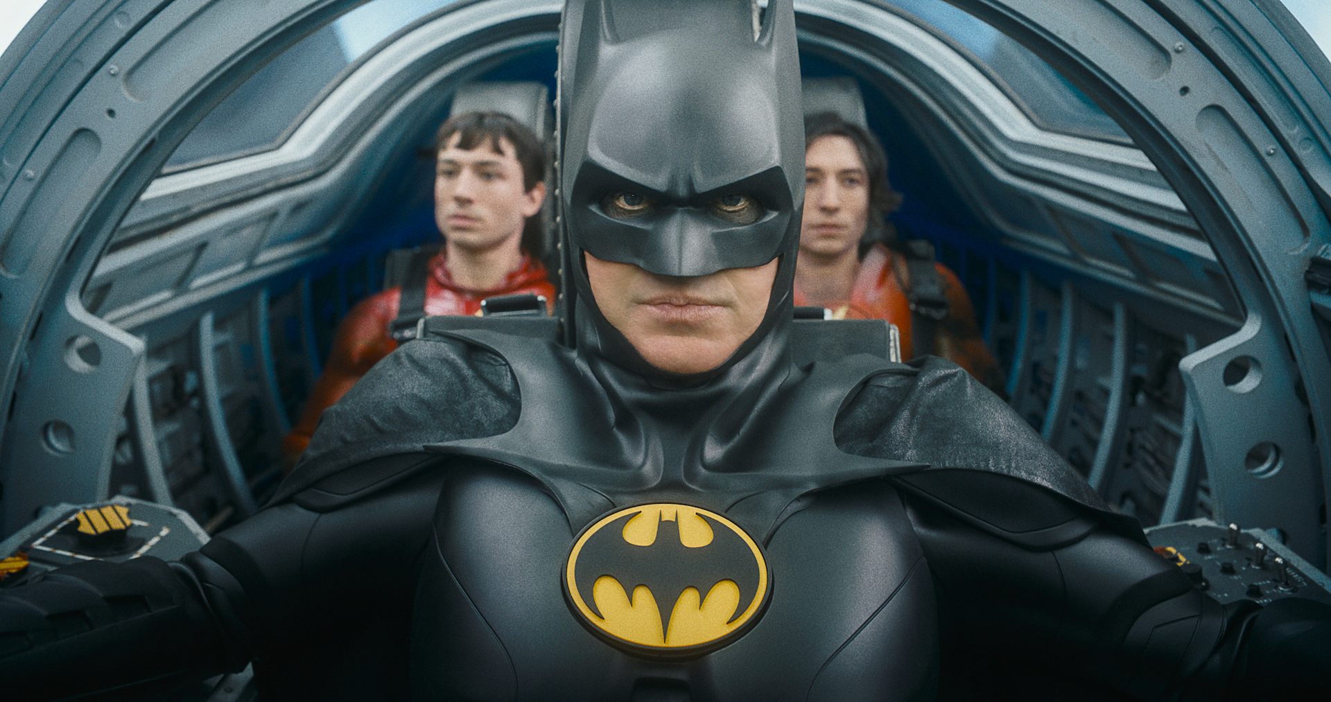 Ezra Miller as The Flash, Michael Keaton as Batman and Ezra Miller as The Flash in the cockpit of a plane.