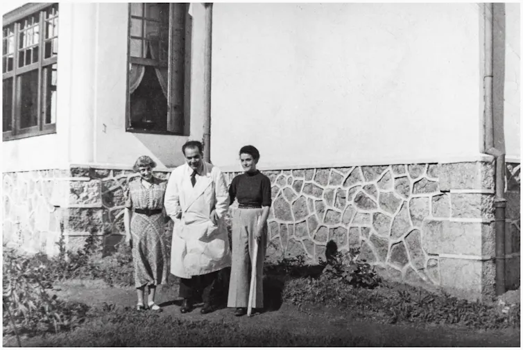 Black and white photo showing Leonora Carrington with her nanny Mary Kavanaugh and Dr Morales outside the sanatorium in Santander.