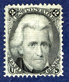 A two cent U.S. stamp bearing the likeness of Andrew Jackson.