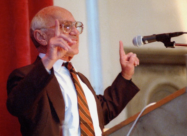 Milton Friedman giving a speech
