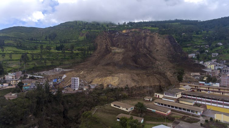 Hillside crumbles into town