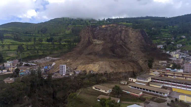 Hillside crumbles into town