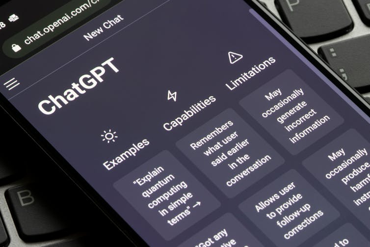 Webpage of ChatGPT, a prototype AI chatbot, is seen on the website of OpenAI, on a smartphone.