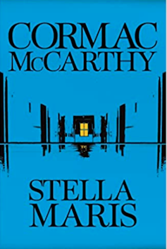 A blue book cover of Cormac McCarthy's Stella Maris.