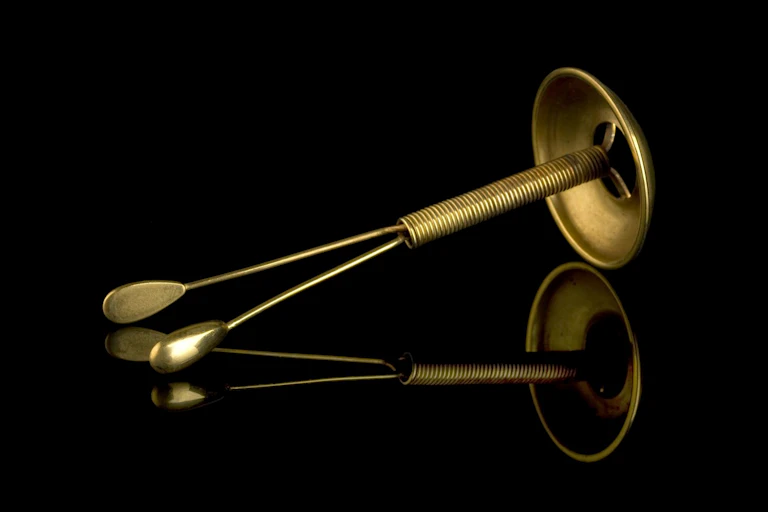 Gold intra-uterine device, wishbone stem pessary.