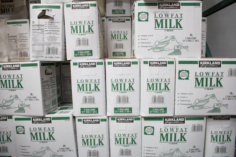 Low-fat milk pile in supermarket