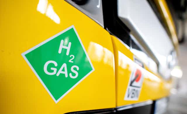 Bus with sign for hydrogen gas