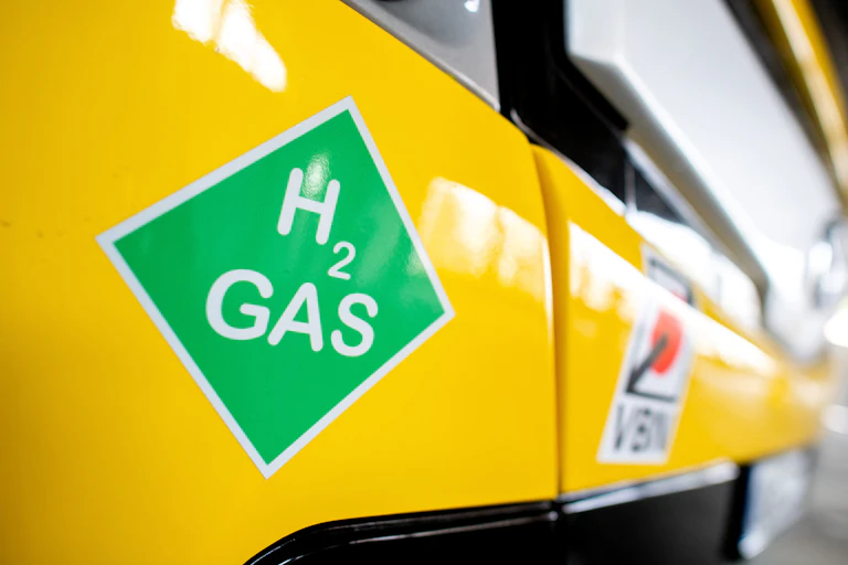 Bus with sign for hydrogen gas