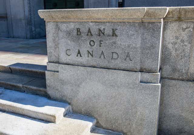 A concrete marker that says 'Bank of Canada' on it.
