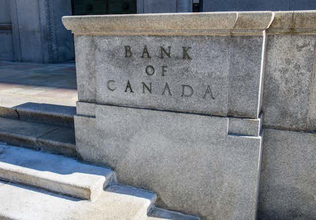 A concrete marker that says 'Bank of Canada' on it.