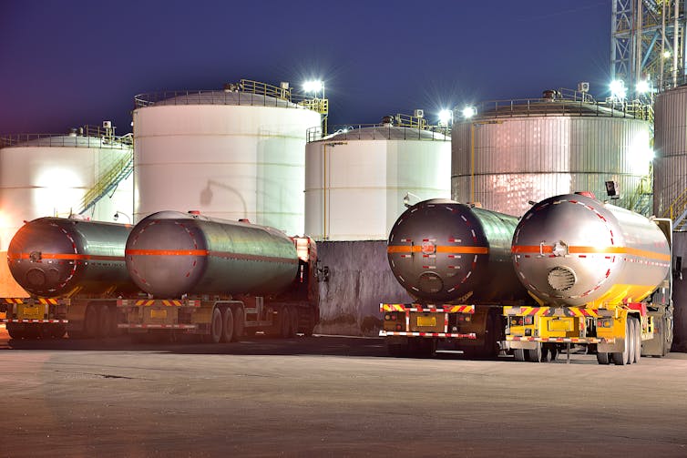Oil truck tankers at an oil refinery.