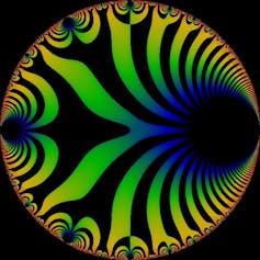 A circle containing curving black stripes against other colors, mostly yellow, green, and blue.