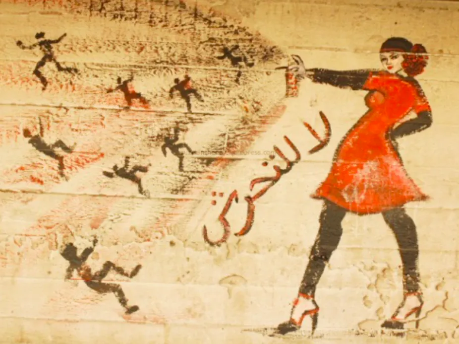 Graffiti art of a woman spraying people out of a spray paint can.