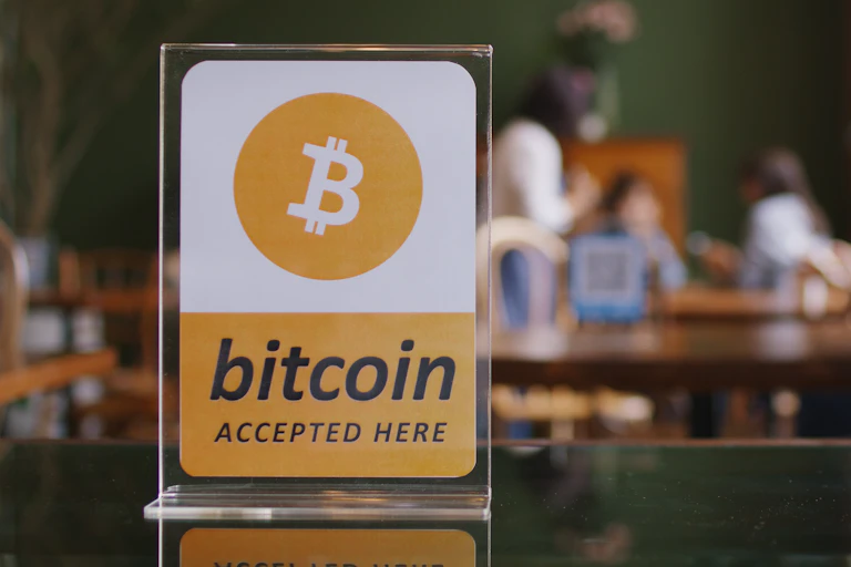 "bitcoiin accepted here" sign in cafe/restaurant