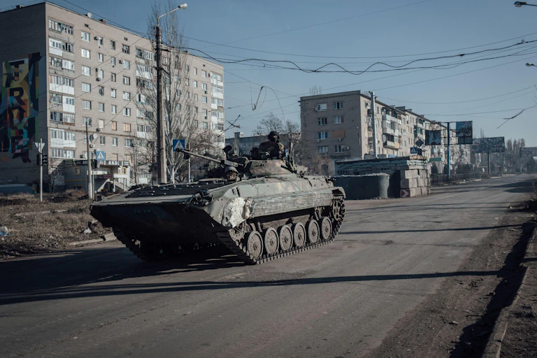 A tank rolls through the city of Bakhmut.