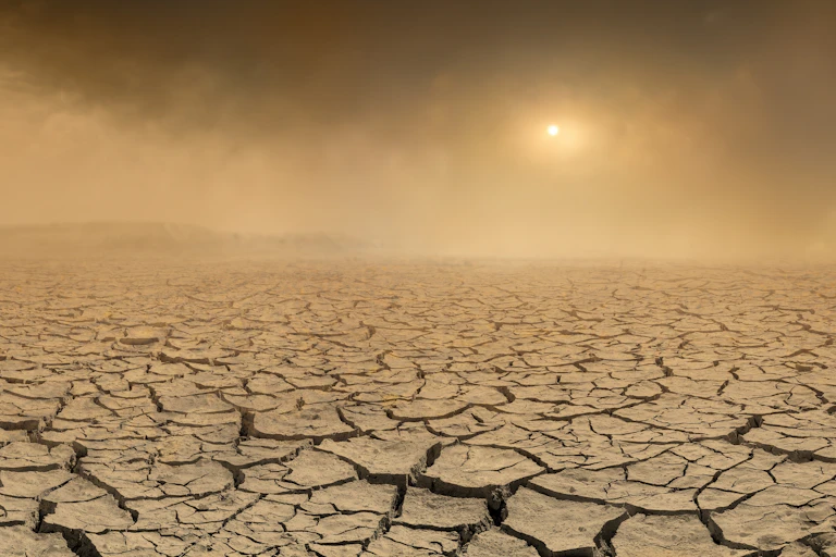 Dried out ground in dust storm