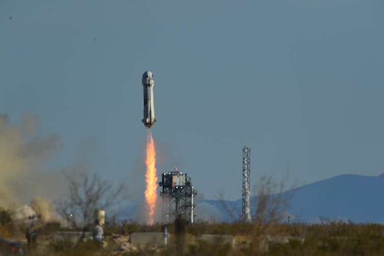 A rocket launching from the desert.