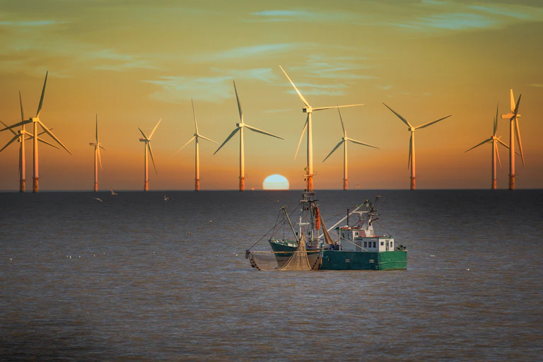 Fishing boat and wind turbines