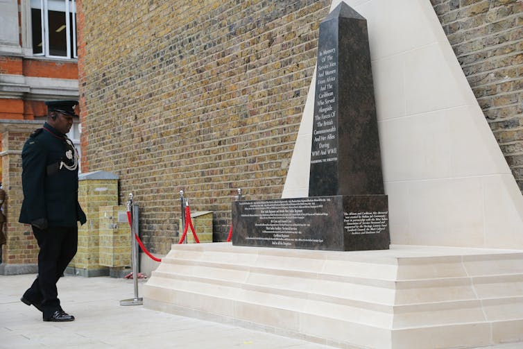 A war memorial with a solider.