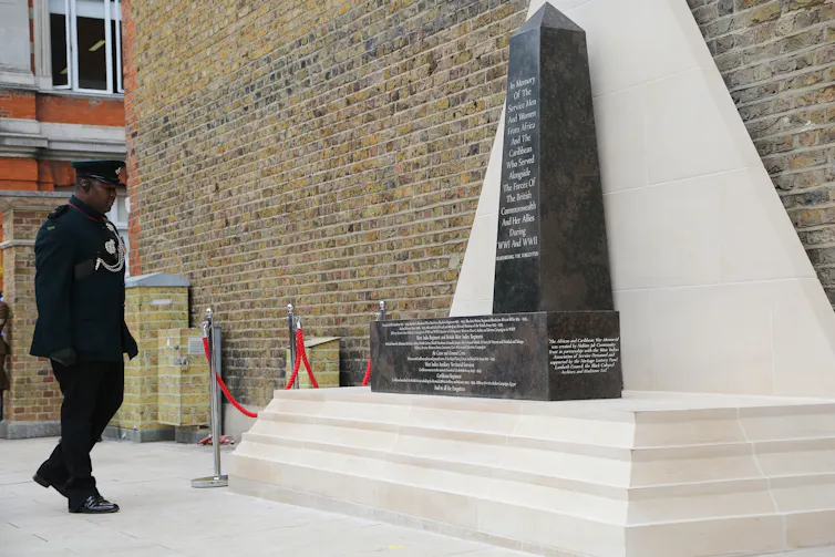 A war memorial with a solider.