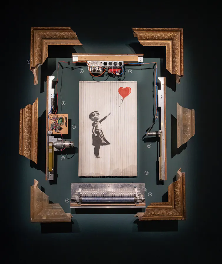 An image called Girl with Balloon by the graffiti artist Banksy.