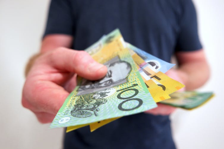 Man holding cash