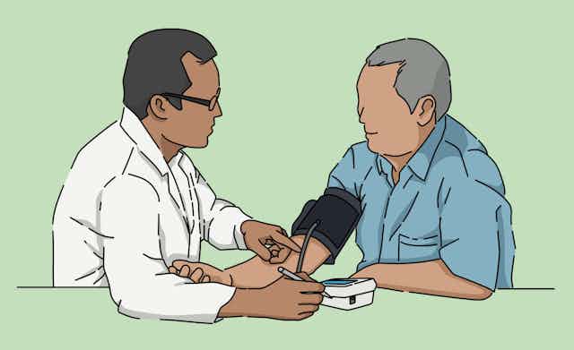 Illustration of GP taking blood pressure of a patient.