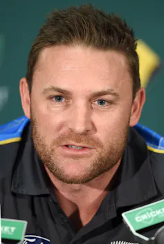 Brendon McCullum during a press conference in 2015, when he was still New Zealand captain. He wears the black New Zealand kit.