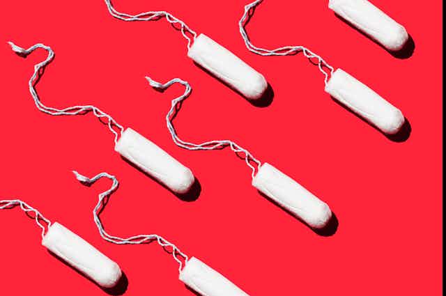 Tampons on a red background.