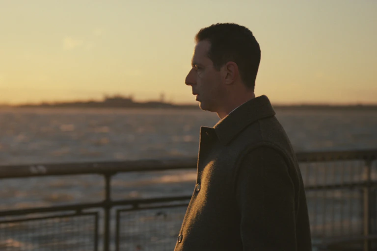 Kendall Roy (Jeremy Strong) gazing into the sunset in the final episode of Succession.