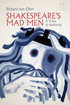 Image of a mask seen on the cover of a book.