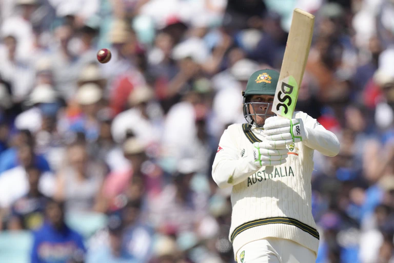 Usman Khawaja plays a shot